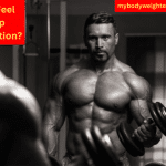 A Muscular Man Looking in a Mirror While Doing Dumbbell Bicep Curls