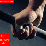 A Man's Hand Holding a Barbell Preparing to Deadlift