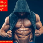 A Muscular Man in a Hooded Top Showing Off His Torso