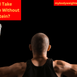 An Athletic Man With His Back to Us Holding a Shaker Bottle in Each Hand, One Contains Creatine, the Other Has Protein