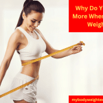 An Athletic Women Measuring Her Waist With a Measuring Tape