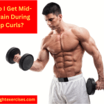 A Muscular Man Performing Dumbbell Bicep Curls