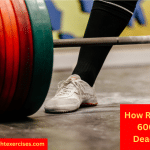 Close Up of a Man's Foot and a Loaded Barbell Set Up For a Deadlift