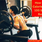 An Athletic Man Doing Barbell Back Squats in the Squat Rack at a Gym