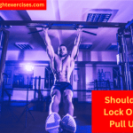 A Muscular Man Performing Pull Ups