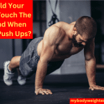 An Athletic Man Performing Push Ups