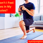 An Athletic Man Performing Kettlebell Lunges at Home