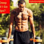 An Athletic Man Doing Dips Outdoors With Tress in the Background
